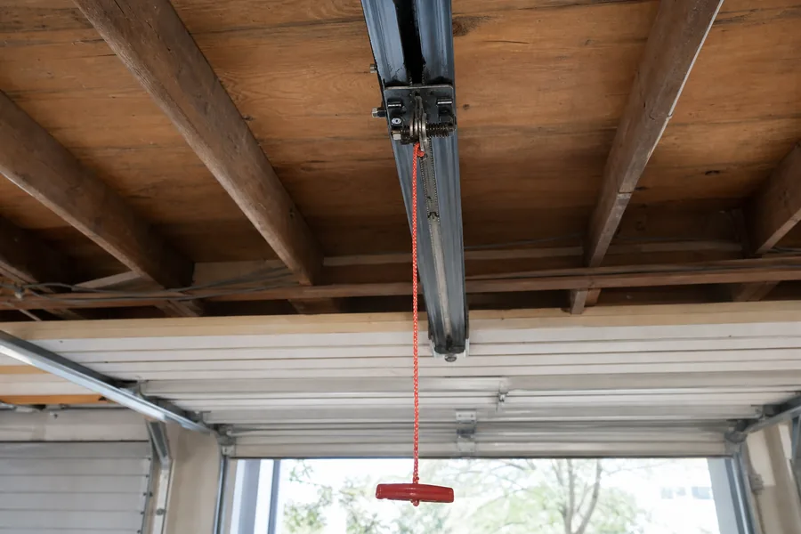 Emergency release cord on a garage door opener in Rockford, IL